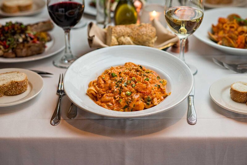 Fettuccine topped with crab, shrimp scallions in a vodka sauce